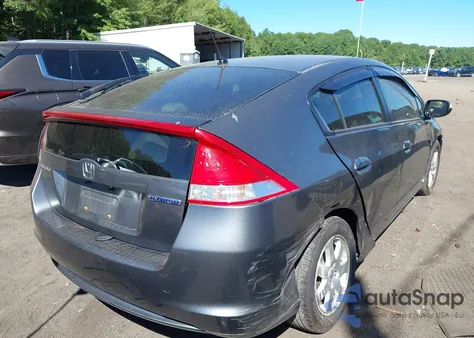 2011 Honda Insight Ex from USA, damaged, VIN JHMZE2H70BS008210